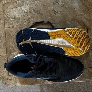 Adidas Dark Blue Sneakers with Vibrant Yellow Sole
